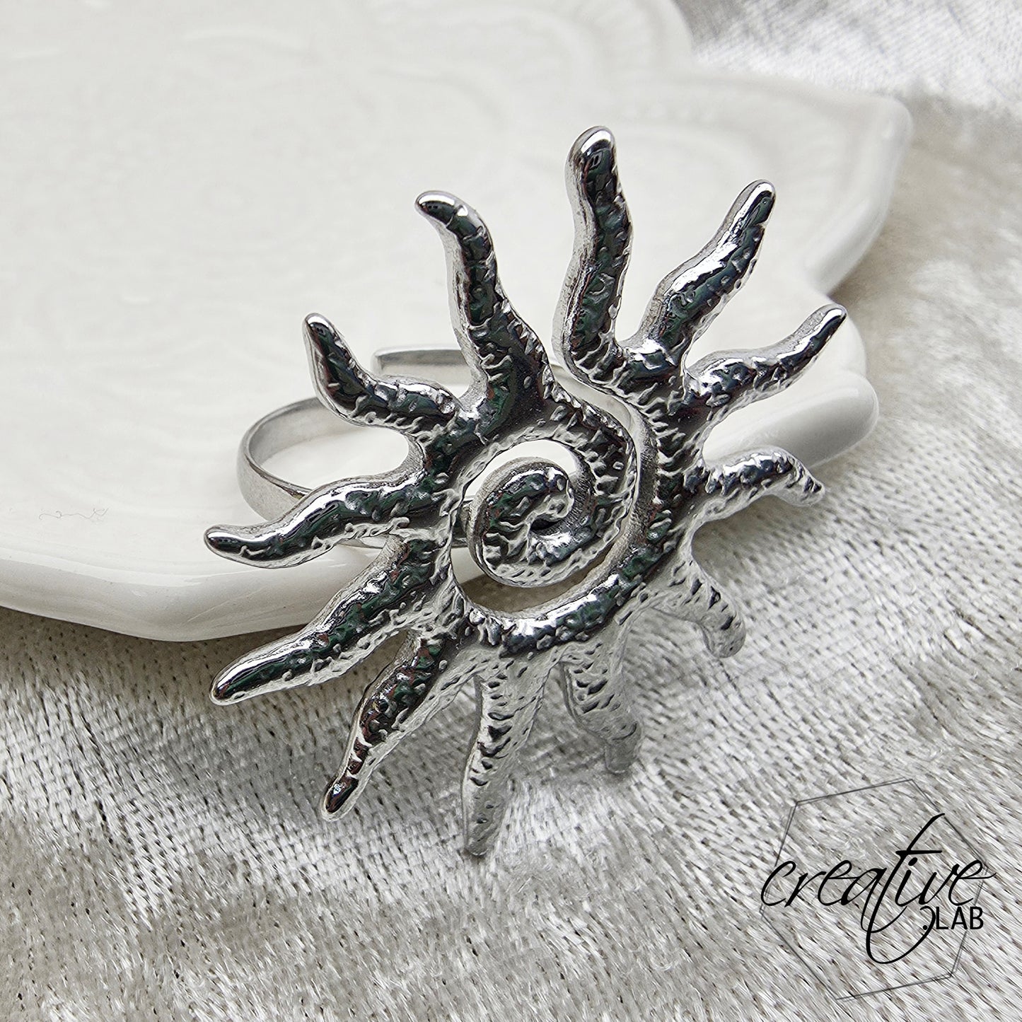 Anello in acciaio Sole