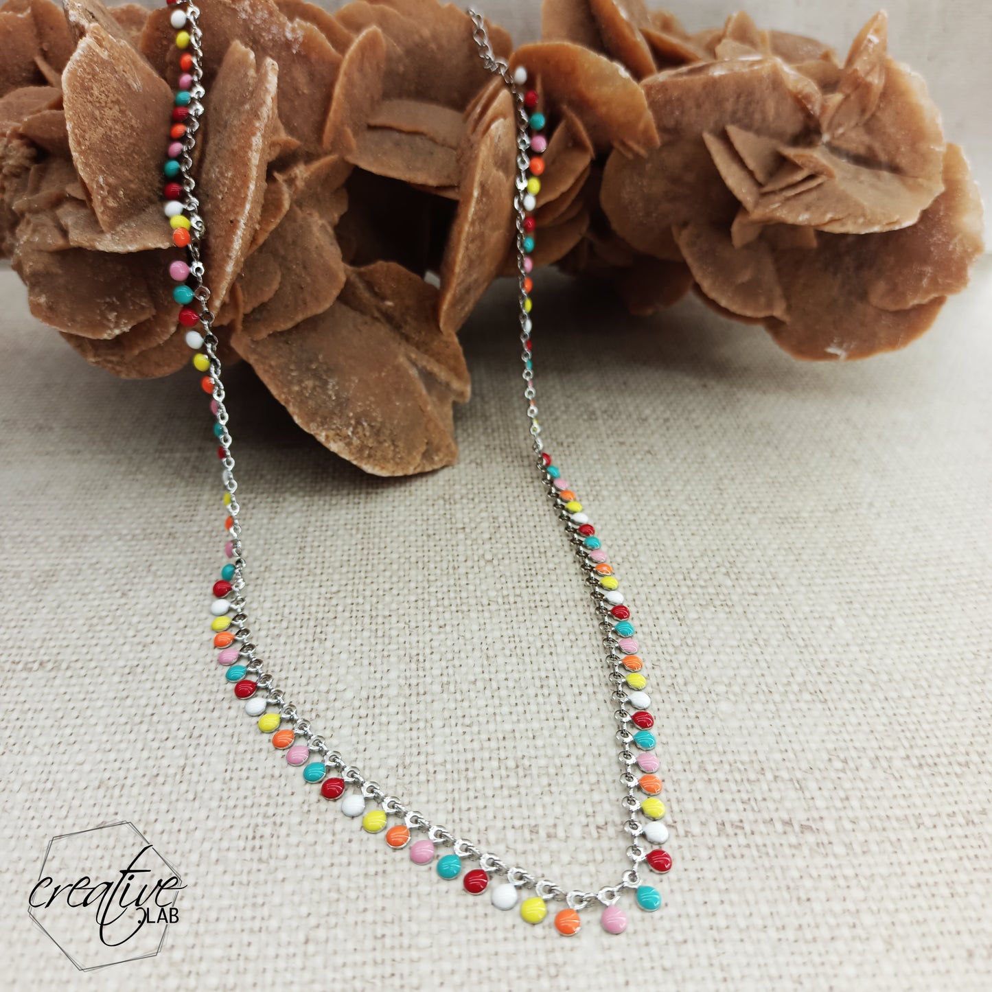 Collanina in acciaio con gocce smaltate