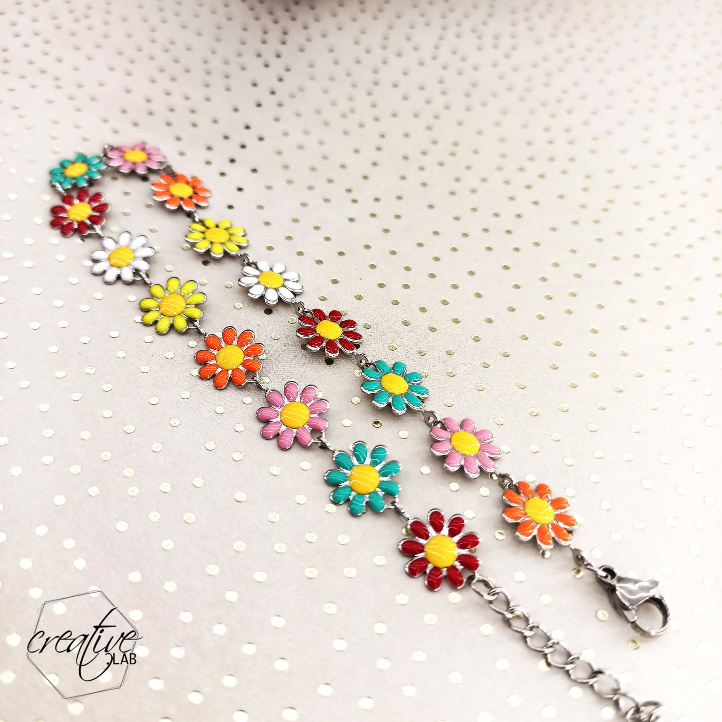 Cavigliera in acciaio con margherite colorate