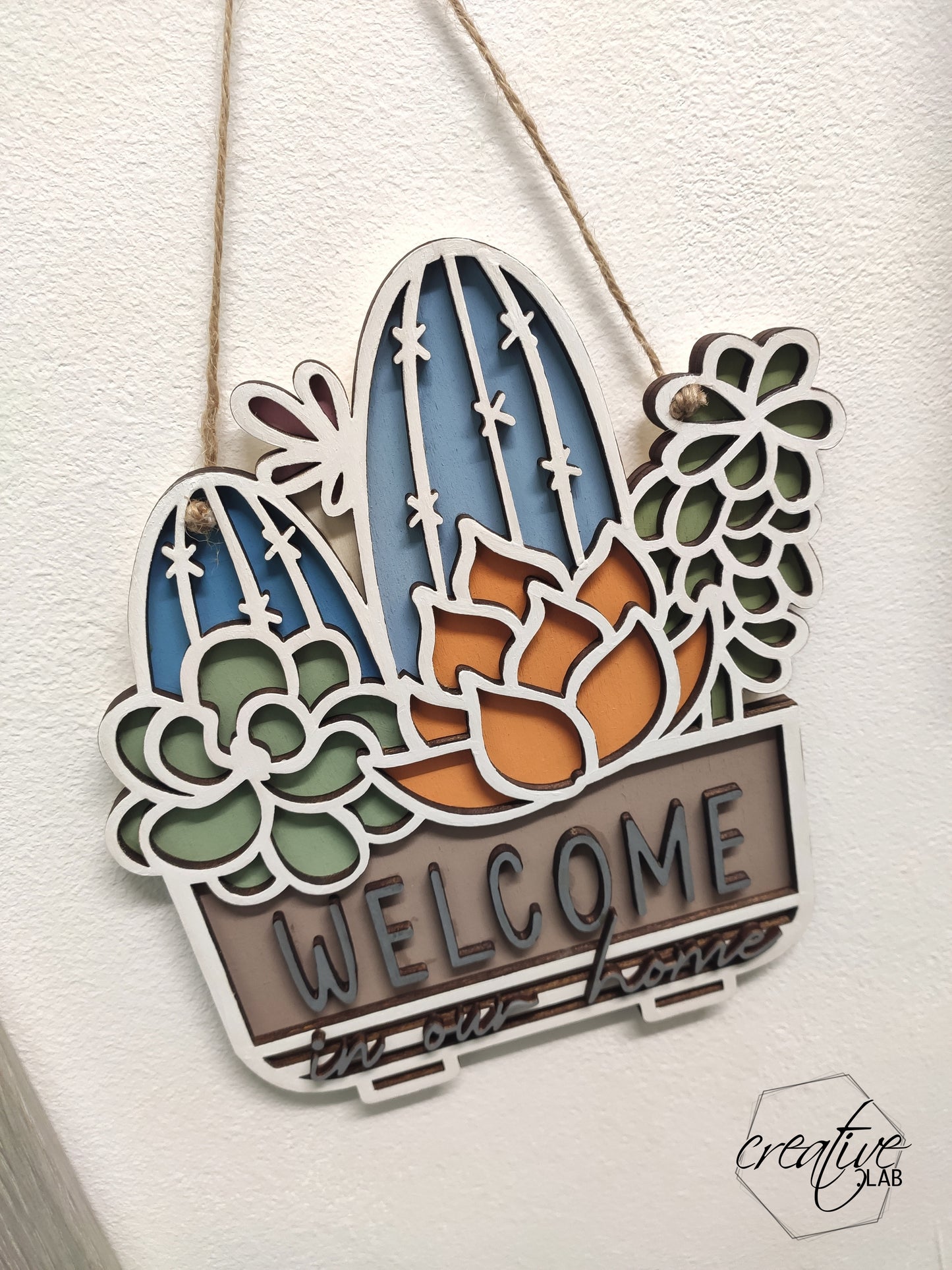 Targa di benvenuto con cactus