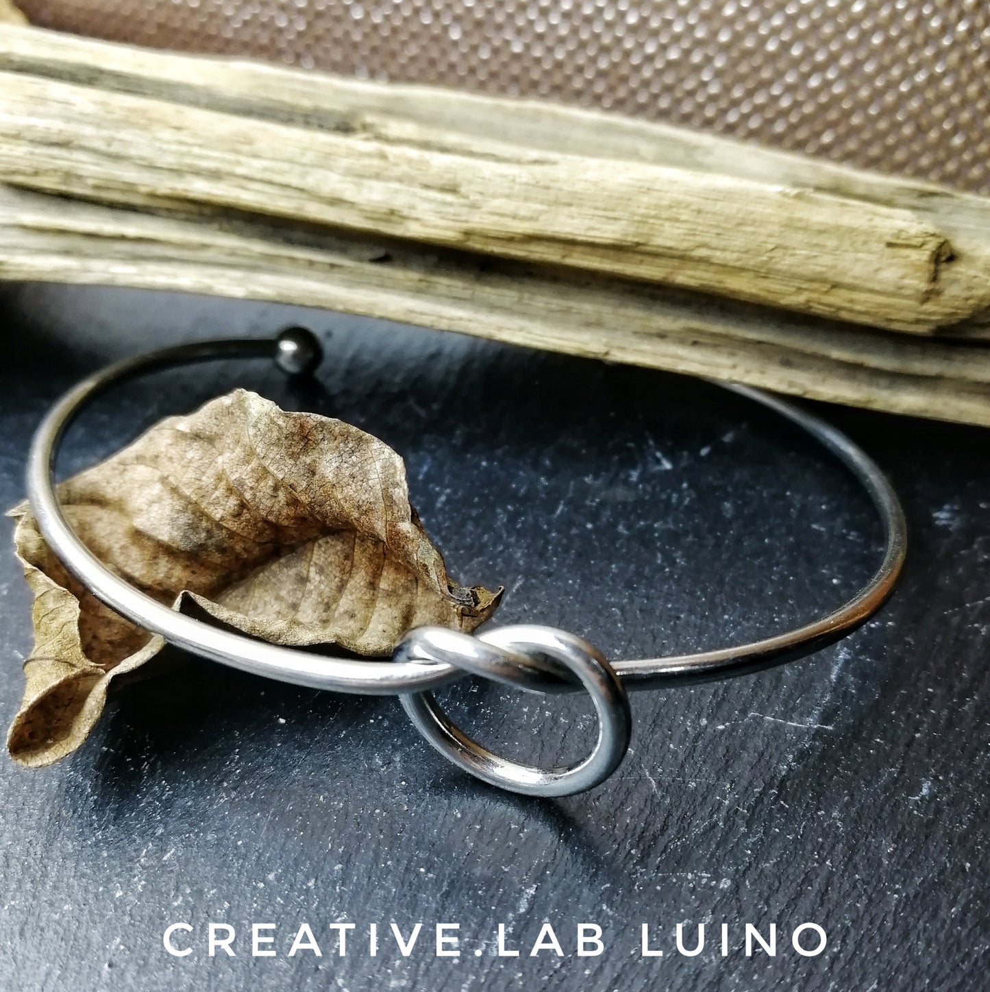 Bracciale rigido con nodo (G11)