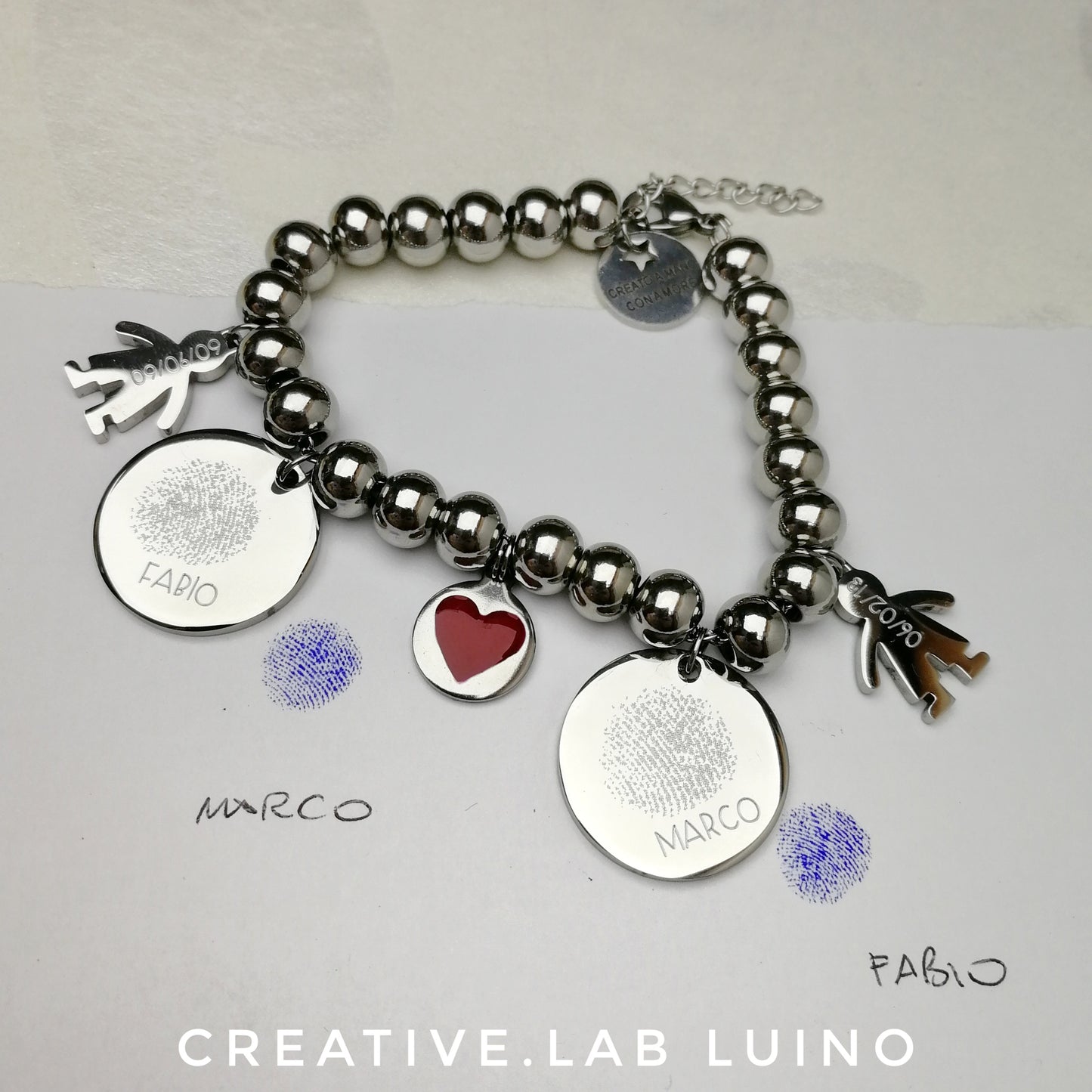 Bracciale con palline in acciaio con ciondoli bimbi e impronta digitale (G44+A20+A9/A10 impr.dig.)