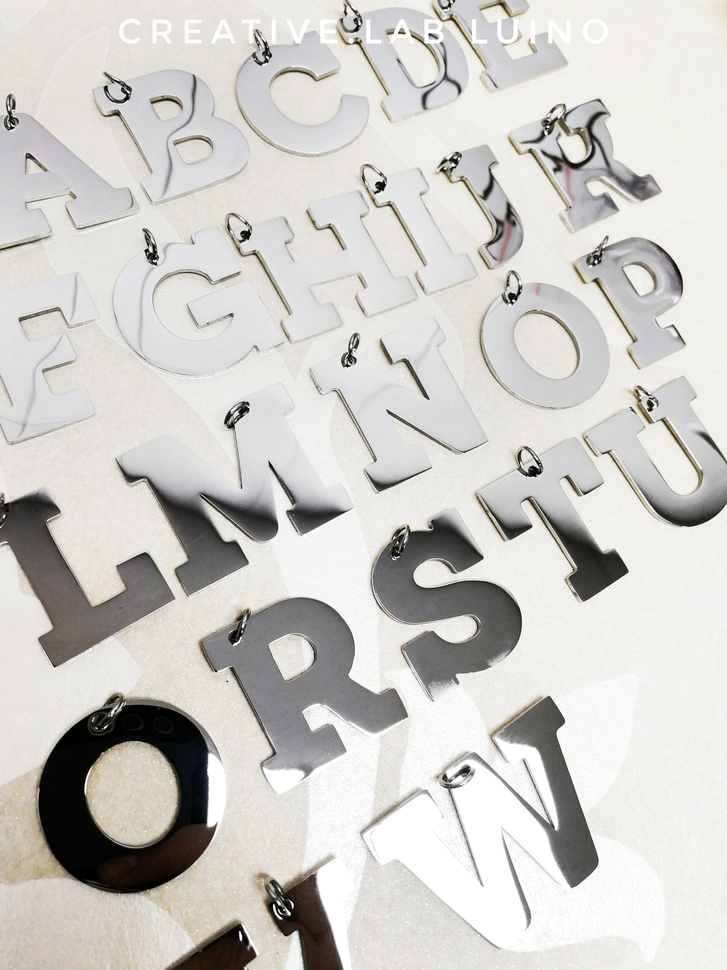 Orecchini a cerchio 50 mm con iniziali