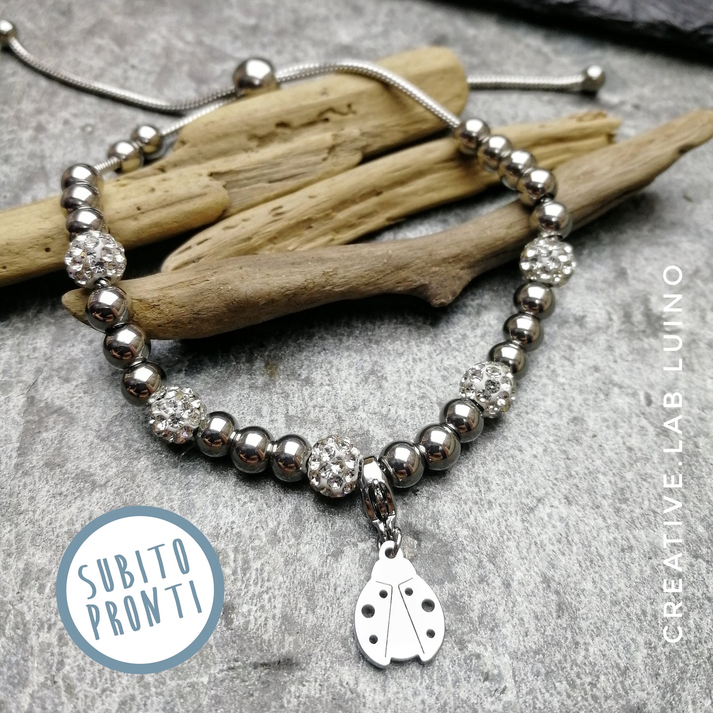 Bracciale snake acciaio con perle strass e coccinella (G152+cocc)