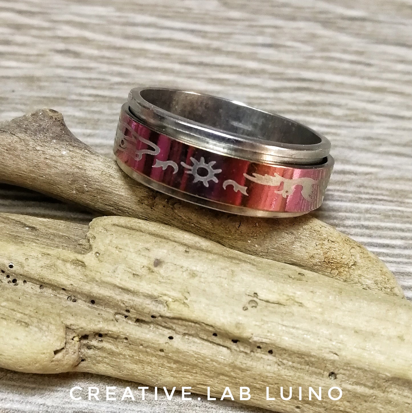 Anello in movimento disegno fenice