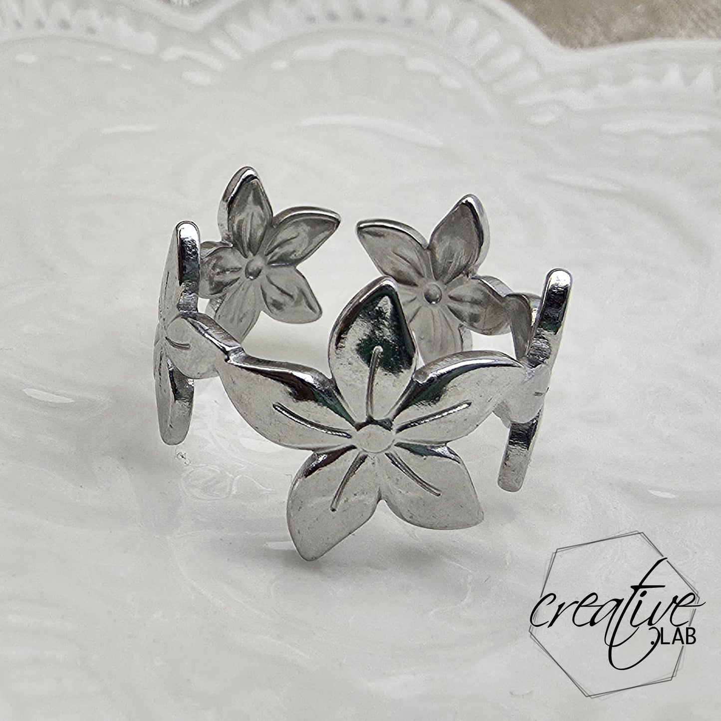 Anello in acciaio fiori
