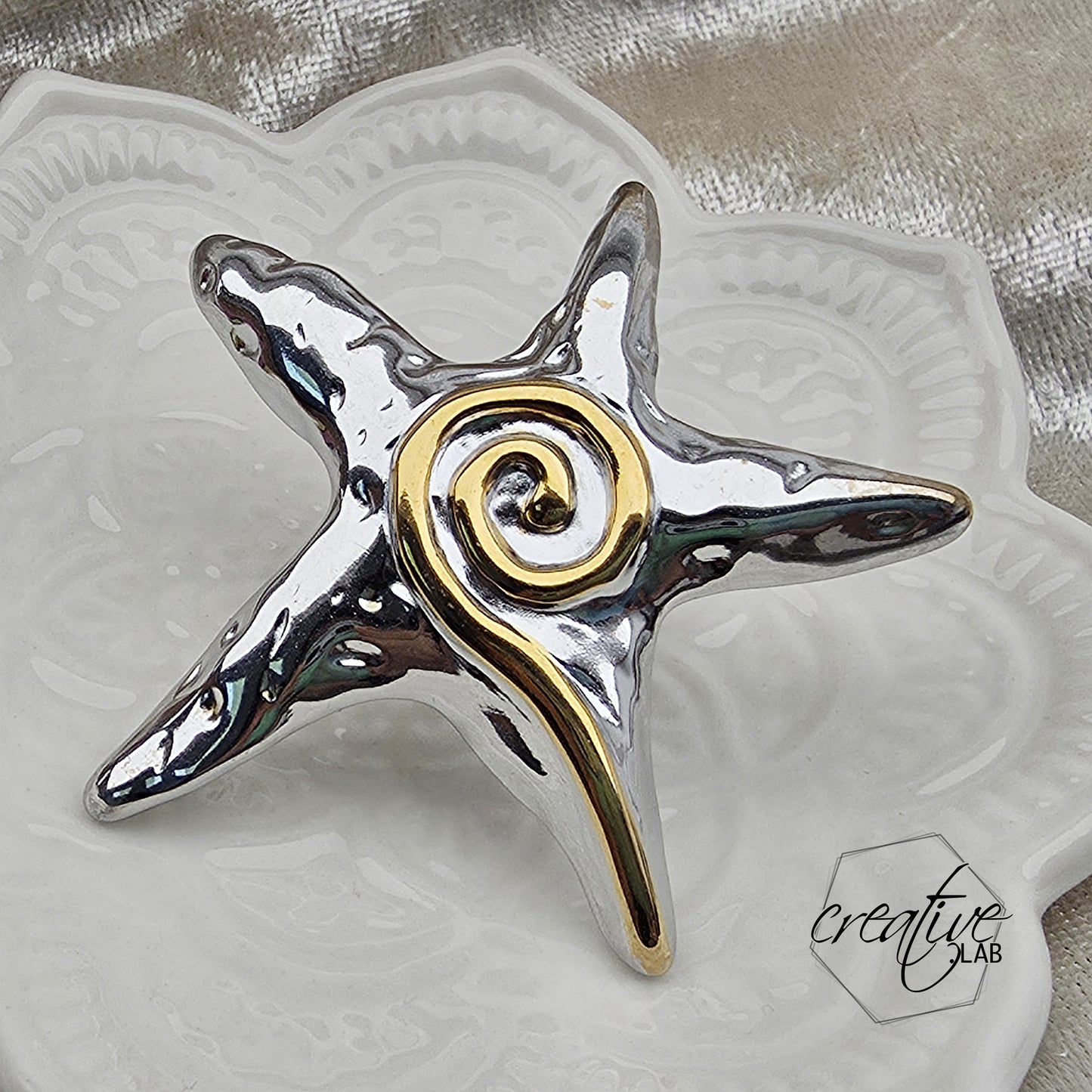 Anello in acciaio oro e argento Grande Stella
