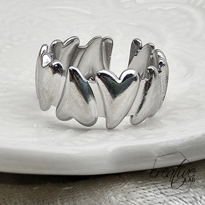 Anello in acciaio Cuori Pieni