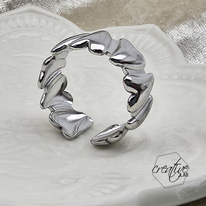 Anello in acciaio Cuori Pieni