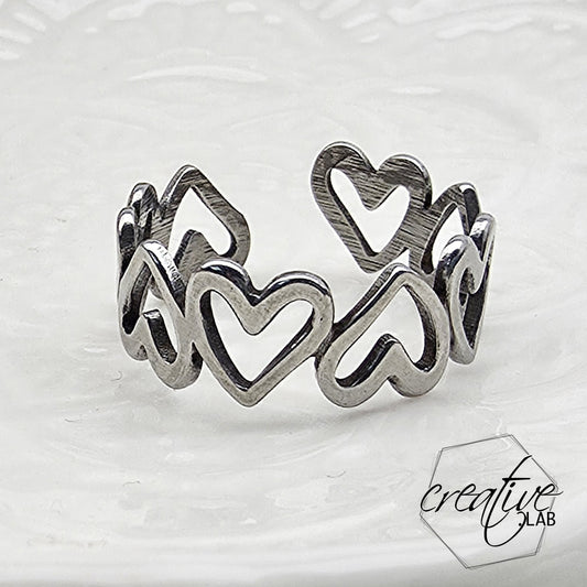 Anello in acciaio Cuori Vuoti