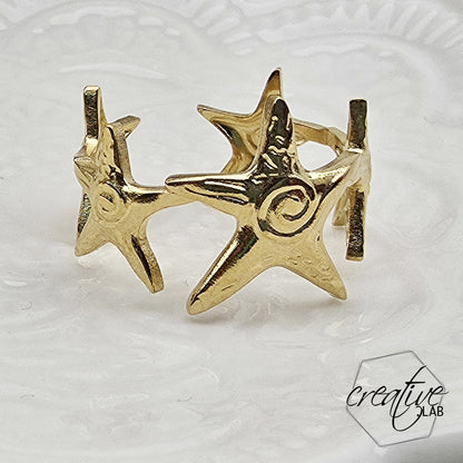 Anello in acciaio oro Stelle
