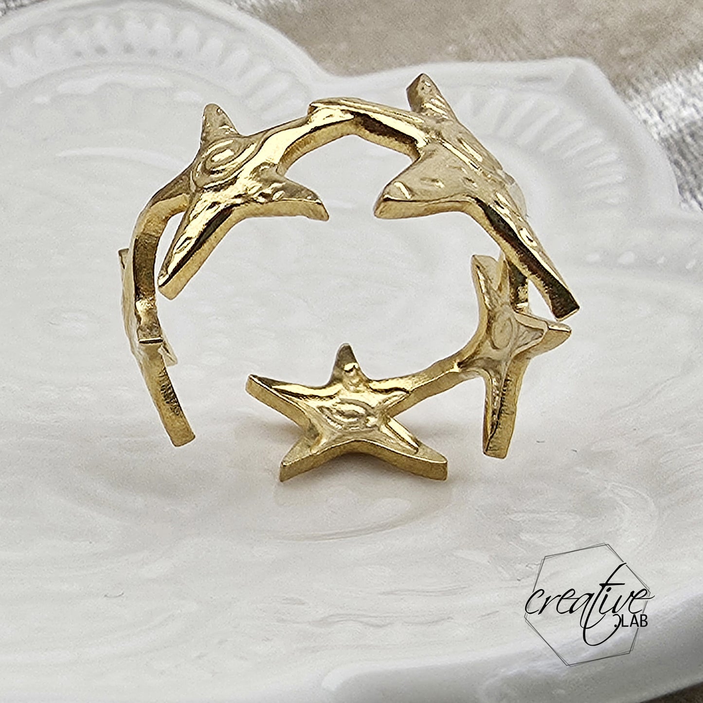 Anello in acciaio oro Stelle