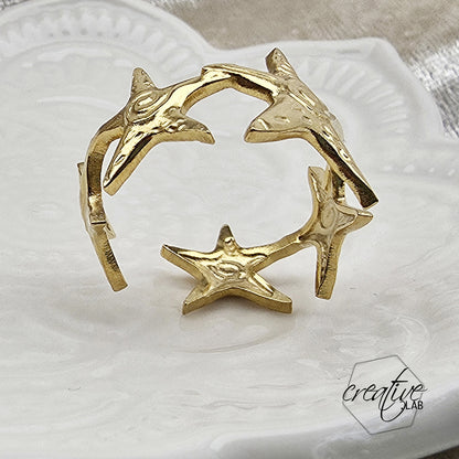 Anello in acciaio oro Stelle