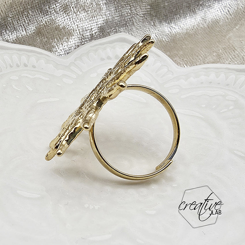 Anello in acciaio oro Sole