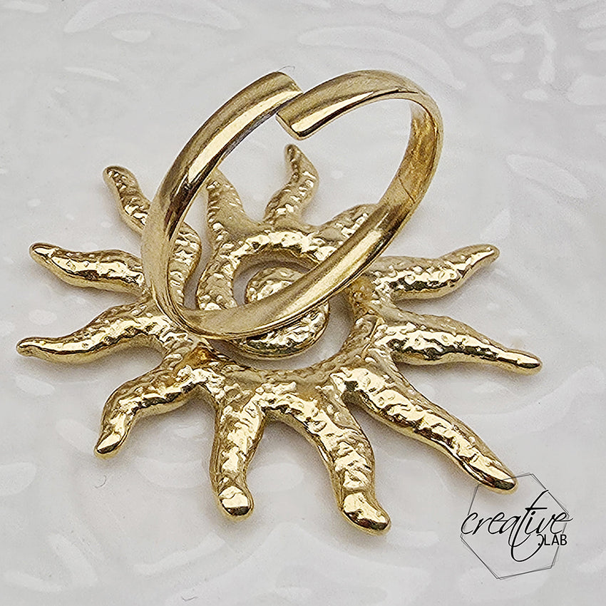 Anello in acciaio oro Sole
