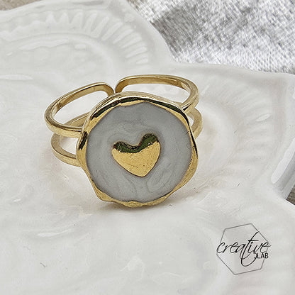 Anello in acciaio oro smaltato bianco a Cuore