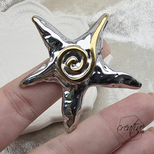 Anello in acciaio oro e argento Grande Stella
