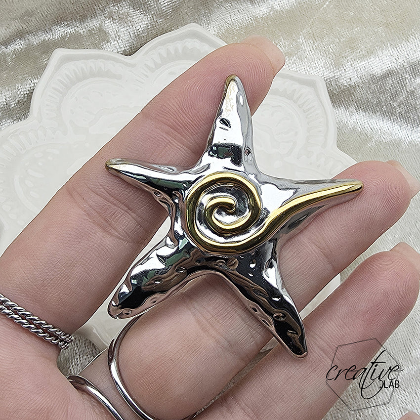 Anello in acciaio oro e argento Grande Stella