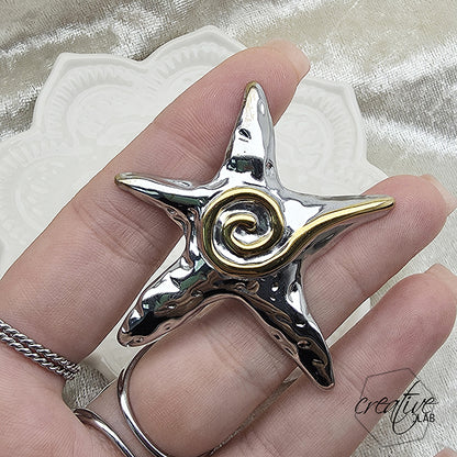 Anello in acciaio oro e argento Grande Stella