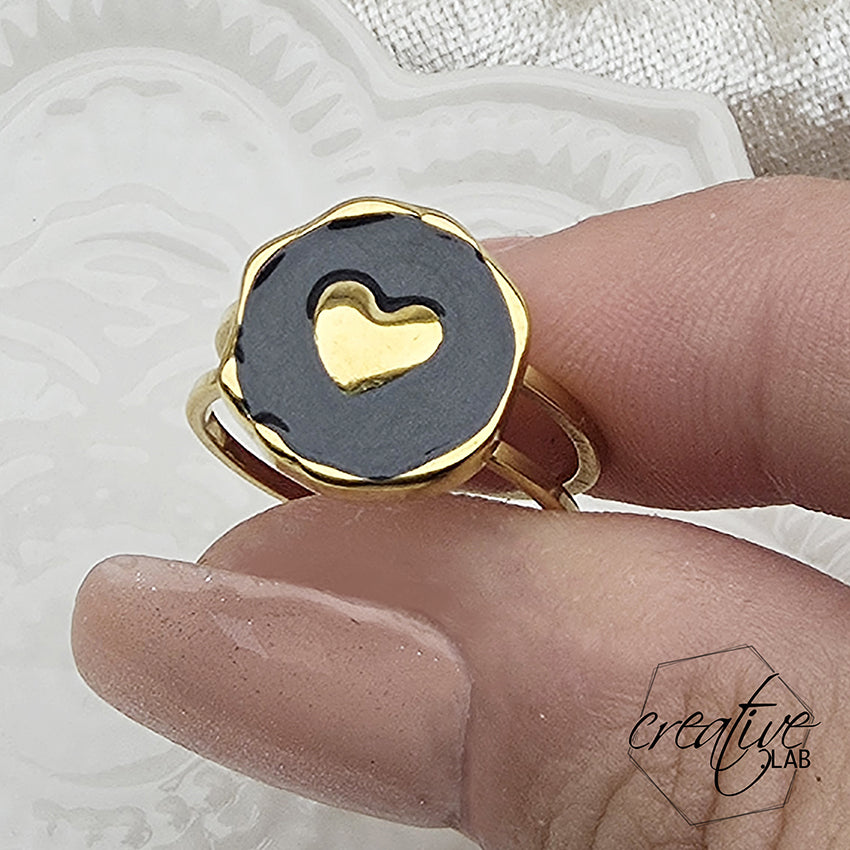 Anello in acciaio oro smaltato nero a Cuore