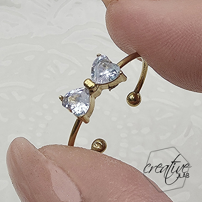 Anello in acciaio oro Fiocco