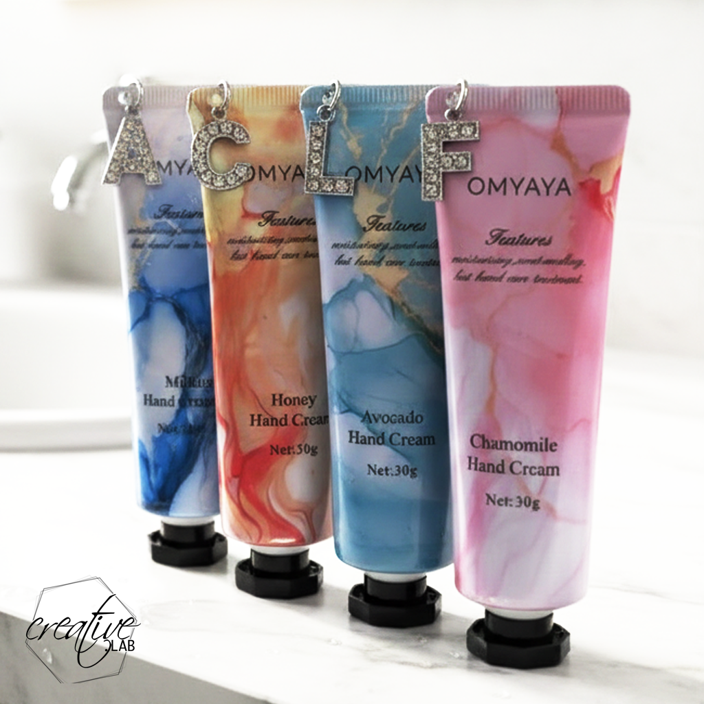 Crema mani con ciondolo iniziale