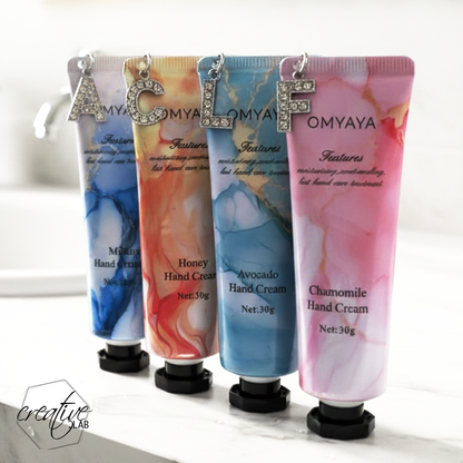 Crema mani con ciondolo iniziale