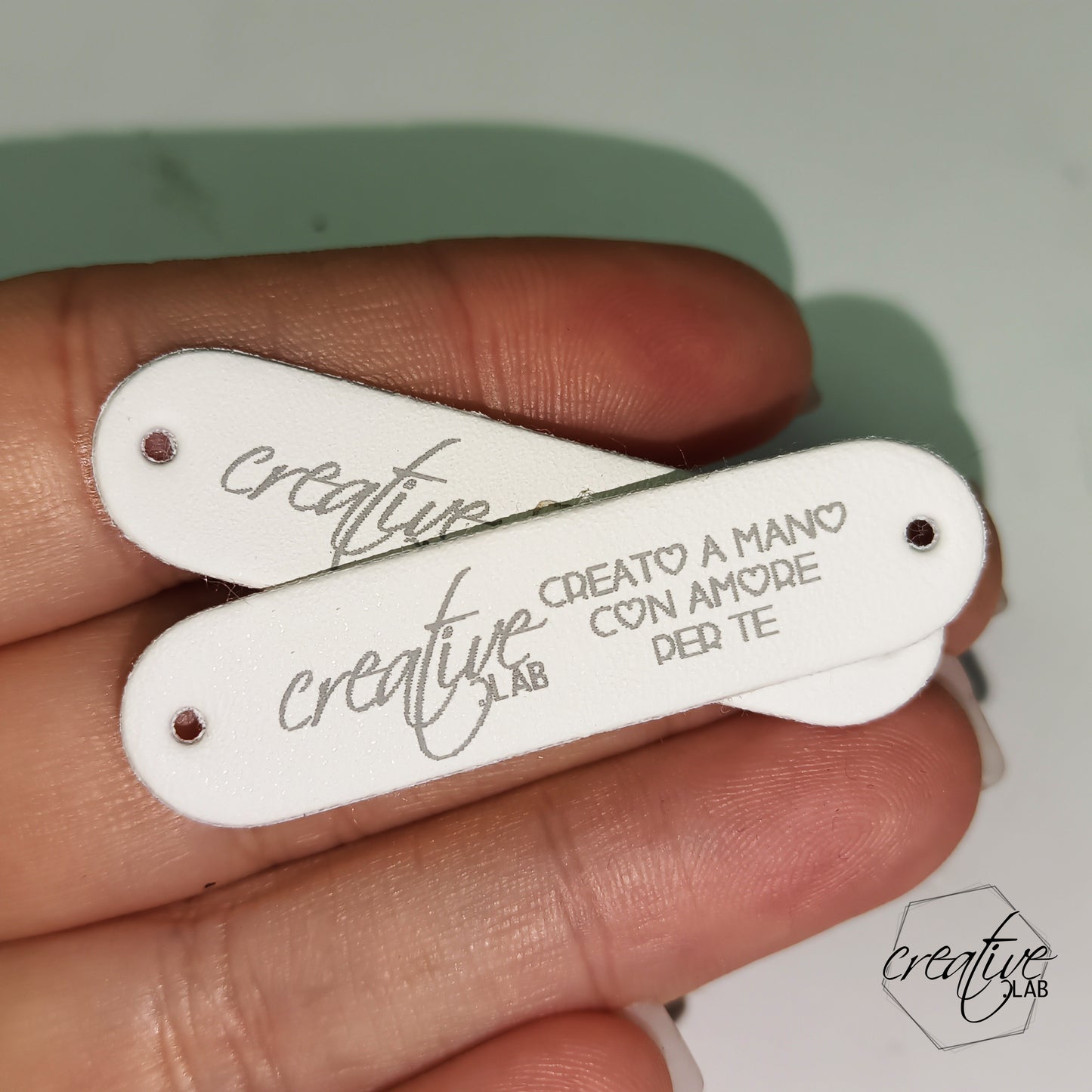 Tags in ecopelle bianche personalizzabili