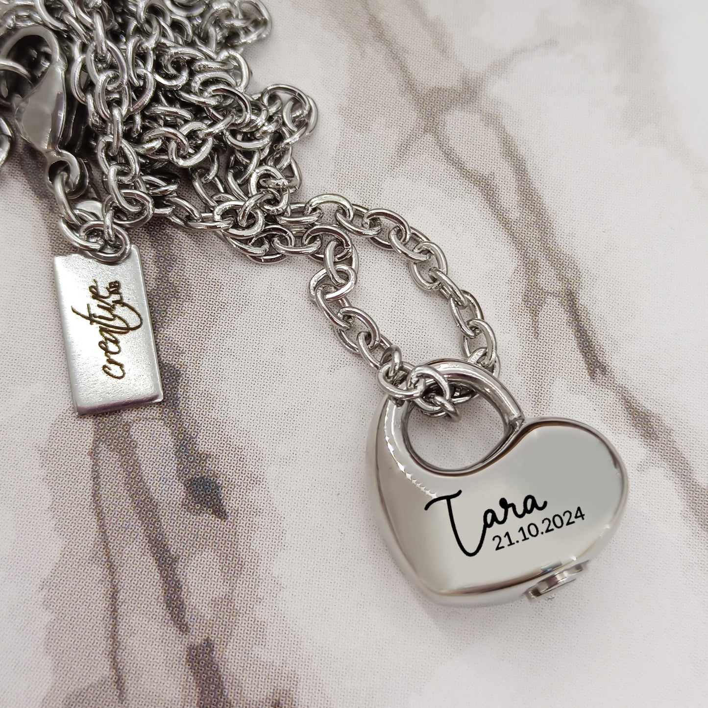 Ciondolo mini cuore urna personalizzabile con catenina in acciaio (UR+D2)