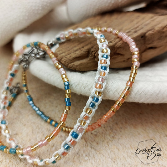 Tris bracciali perline e macramè