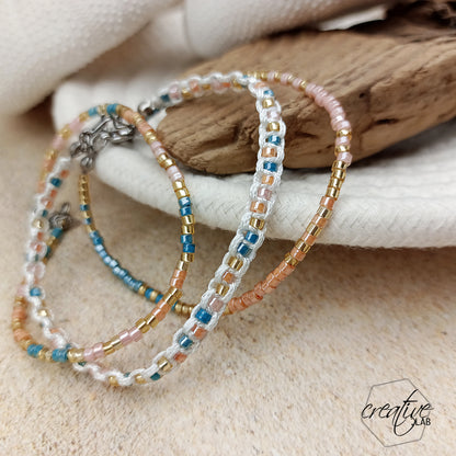 Tris bracciali perline e macramè