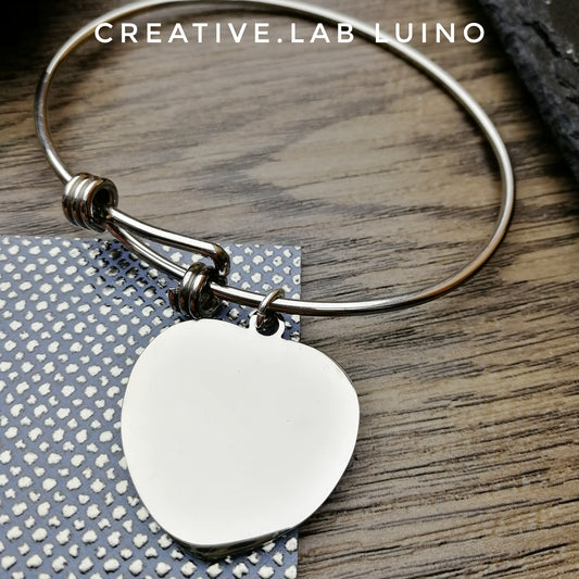 Bracciale rigido con nodi scorsoi e ciondolo da personalizzare cuore (G20+B23)