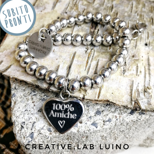 Bracciale a palline in acciaio con ciondolo cuore "100% AMICHE" (G44+A21)