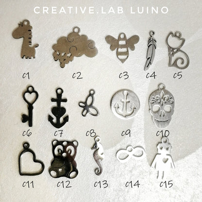 Bracciale con iniziale da personalizzare e ciondolini (bracc+lett+ch)